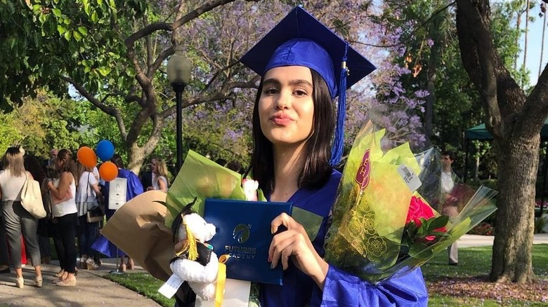 Amelia Hamlin in a graduation gown