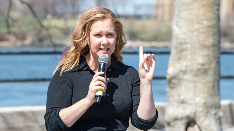 Amy Schumer speaking outside