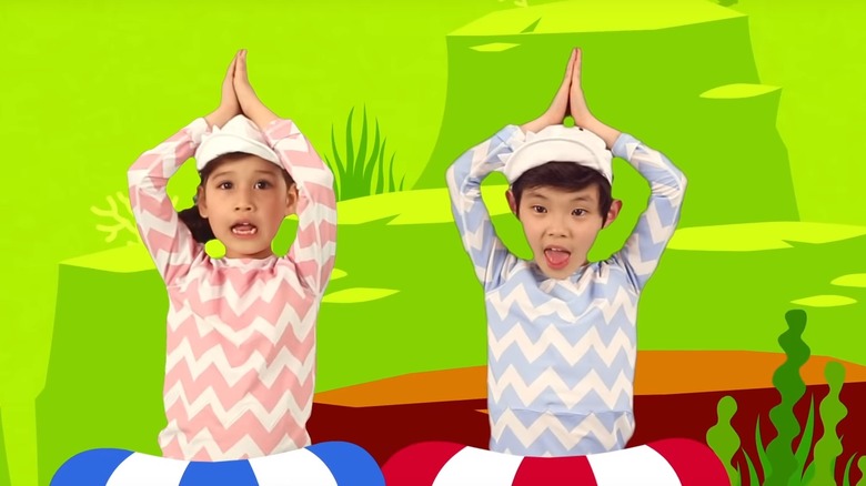 Two kids dancing in Baby Shark 