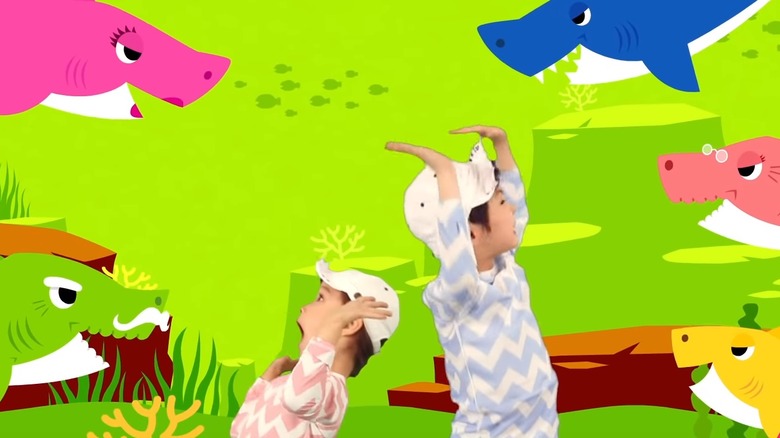 Two kids in the Baby Shark video