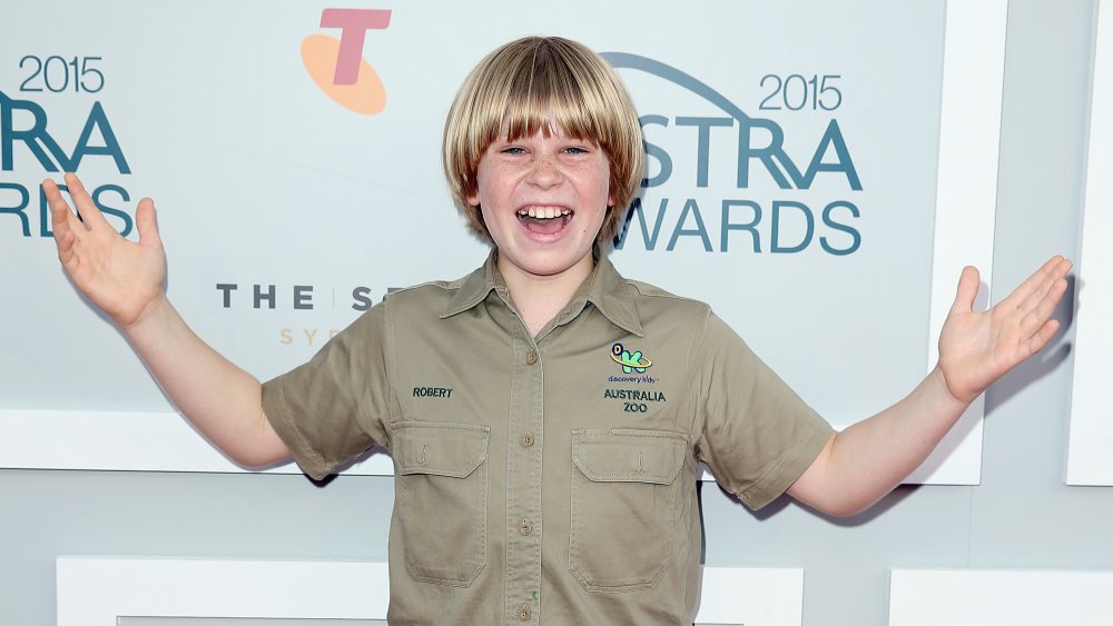 Robert Irwin, Bindi Irwin's brother, with a turtle