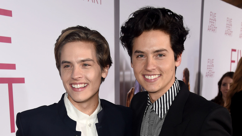 Cole and Dylan Sprouse posing on red carpet