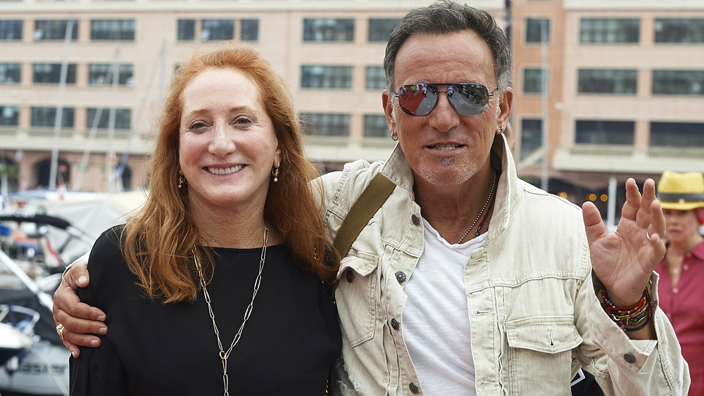 Patti Scialfa and Bruce Springsteen at a harbor