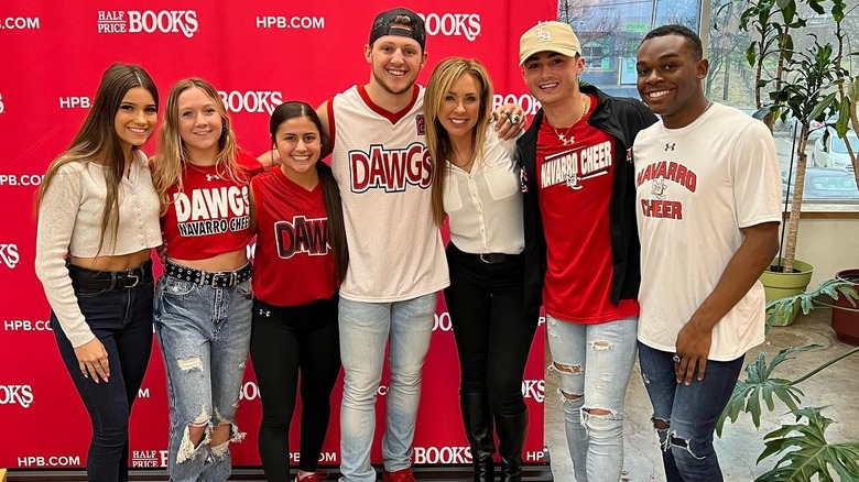 Monica Aldama with group at book signing