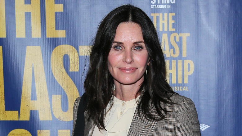 Courteney Cox posing at event 