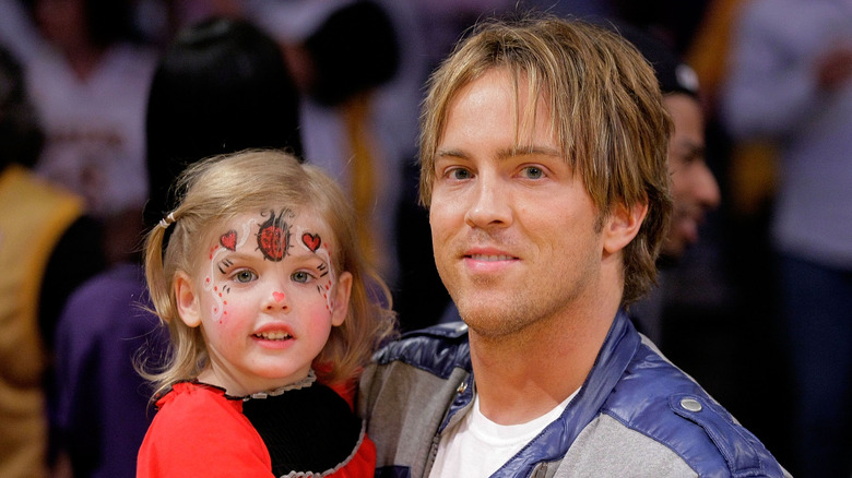 Larry Birkhead holding Dannielynn