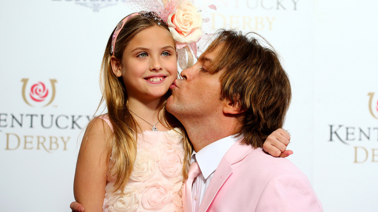 Dannielynn Birkhead posing with Larry Birkhead