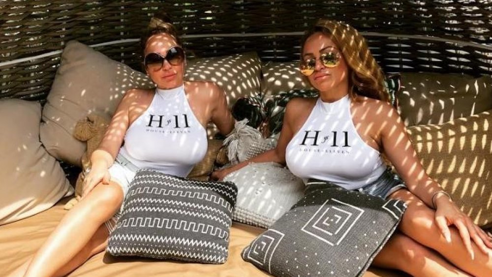 Darcey Silva and Stacey Silva in a lounger