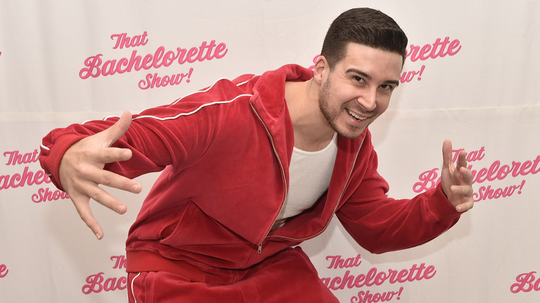 Vinny Guadagnino with arms out