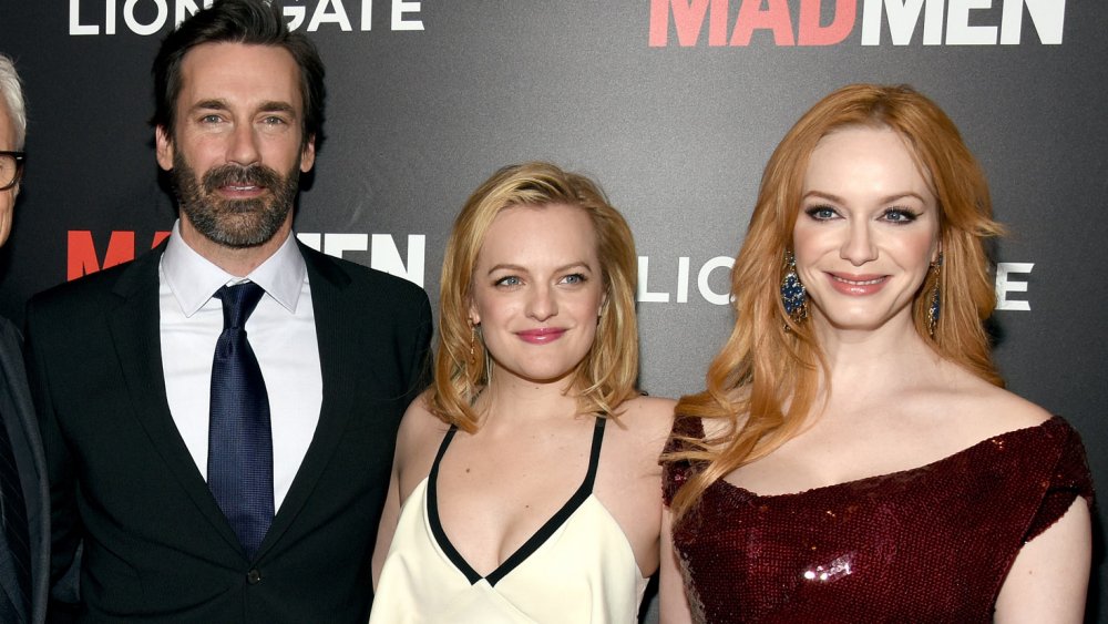 Elisabeth Moss with the cast of Mad Men