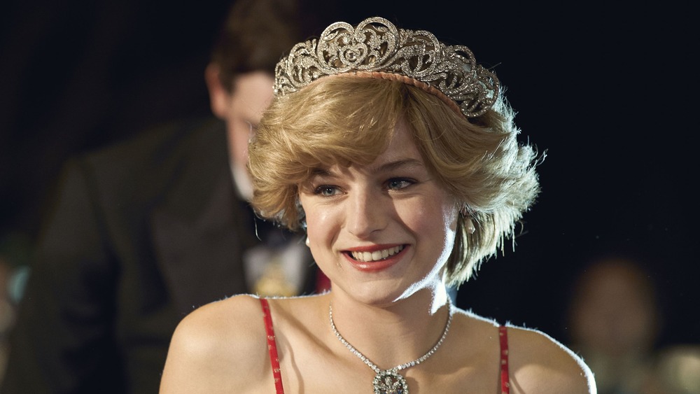 Emma Corrin in The Crown wearing a tiara