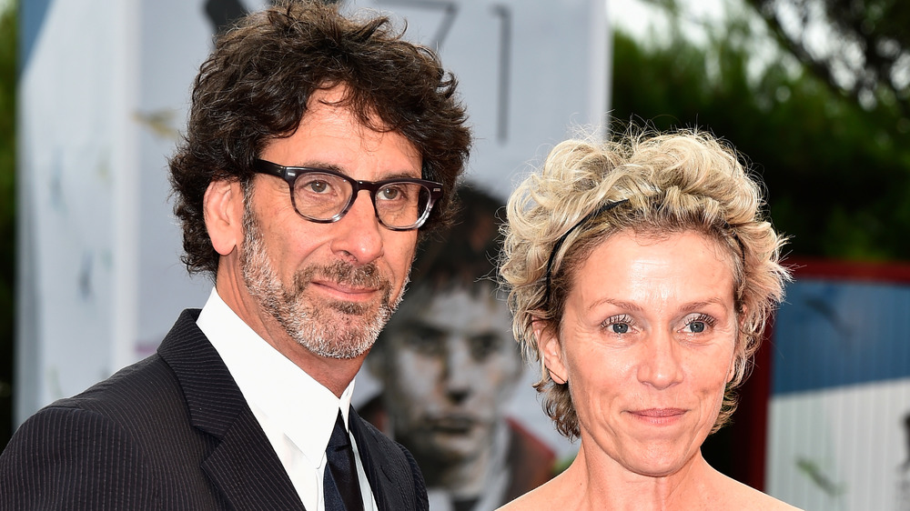 Frances McDormand and Joel Coen smiling