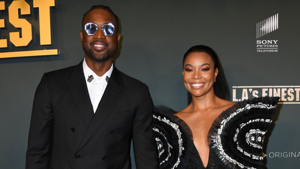 Gabrielle Union and her husband at a Spectrum event in 2019