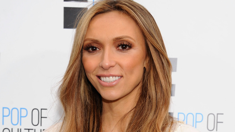 Giuliana Rancic posing, smiling