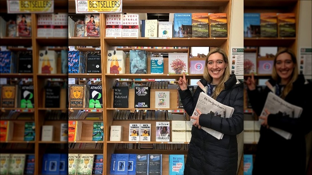 Erin Benzakein with her book at a store