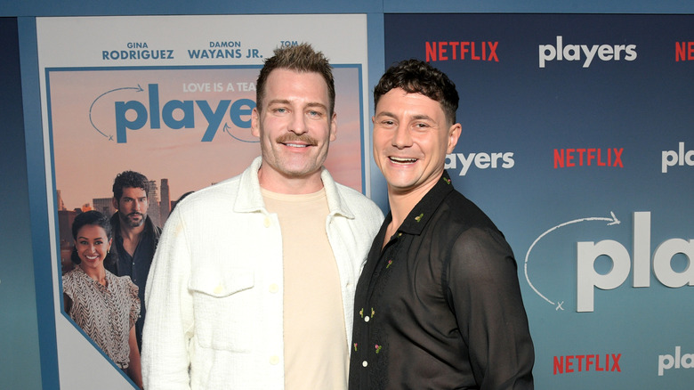 Orlando Soria and Augustus Prew smiling on the red carpet