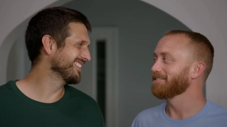 Evan Thomas and Keith Bynum smiling at each other