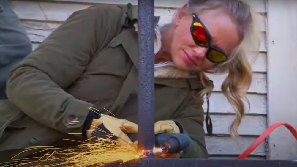 Tamara Day welding on Bargain Mansions