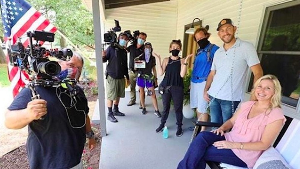 Dave and Jenny Marrs on their porch with their crew