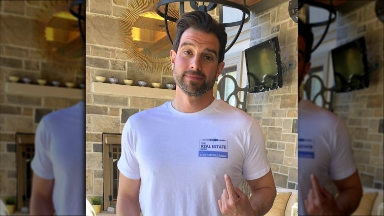 Scott McGillivray pointing to shirt