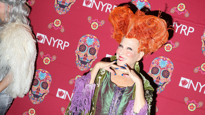 Bette Midler on the red carpet in a Hocus Pocus costume