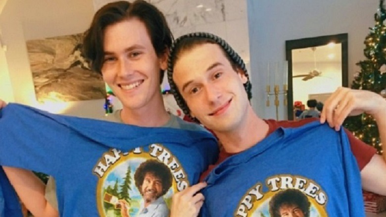 Clint Goodwin and Tyler Henry holding matching T-shirts.