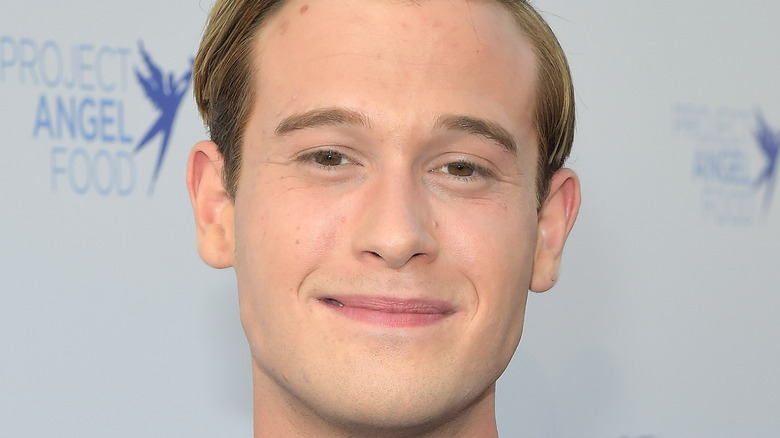 Tyler Henry with a small smile