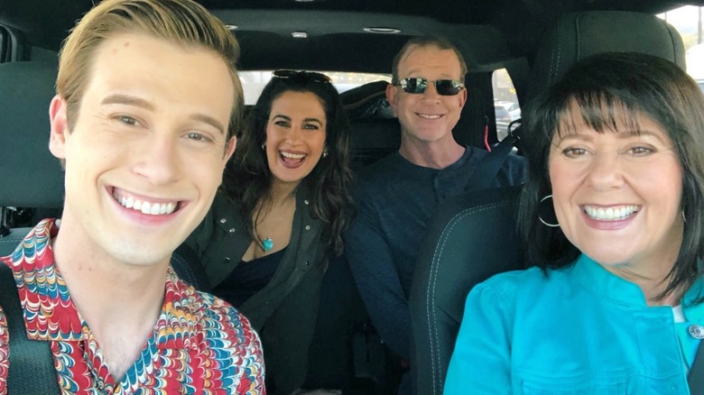 Tyler Henry in a car with family, Mom driving.