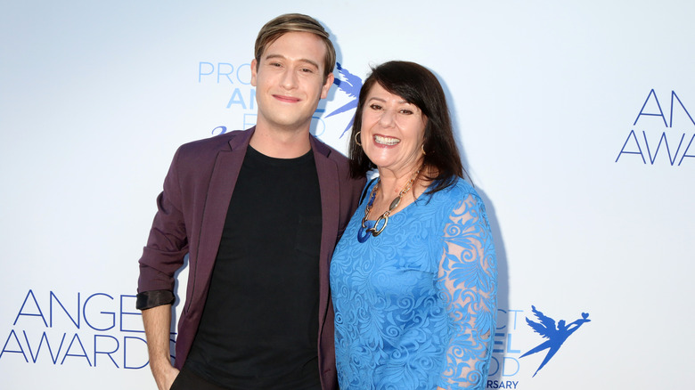 Tyler Henry and Theresa Koelewyn smiling