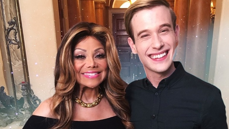 Latoya Jackson and Tyler Henry posing together.