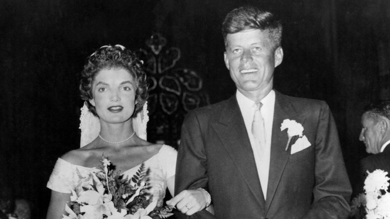 Jackie Kennedy Onassis and JFK on their wedding day