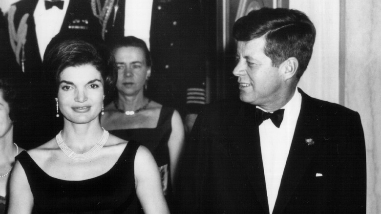 Jackie Kennedy Onassis and JFK at a White House event