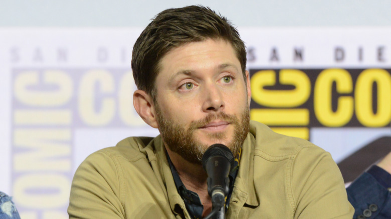 Jensen Ackles in beige jacket at Comic Con 