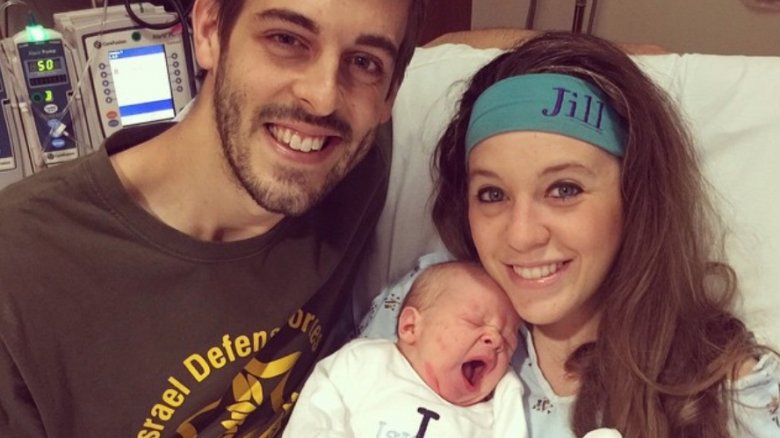 Derick Dillard and Jill Duggar right after giving birth to son