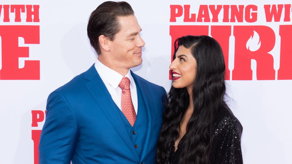 John Cena and wife Shay Shariatzadeh gazing at each other