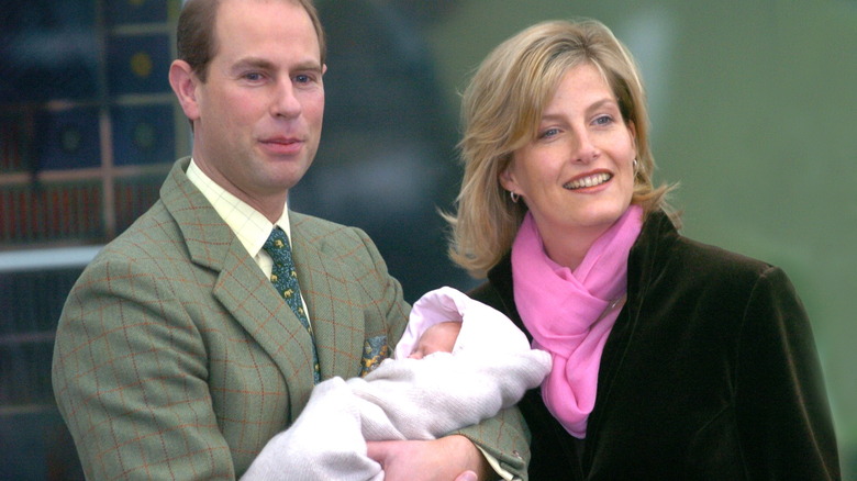 Prince Edward and Sophie, Duchess of Edinburgh, holding baby Louise