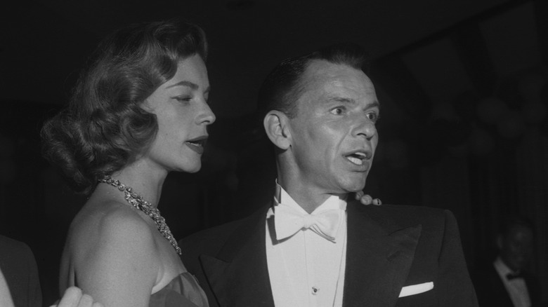 Lauren Bacall and Frank Sinatra at a gala