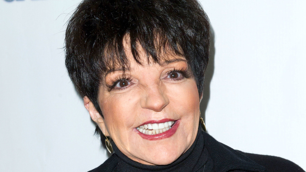 Liza Minnelli wearing black and smiling