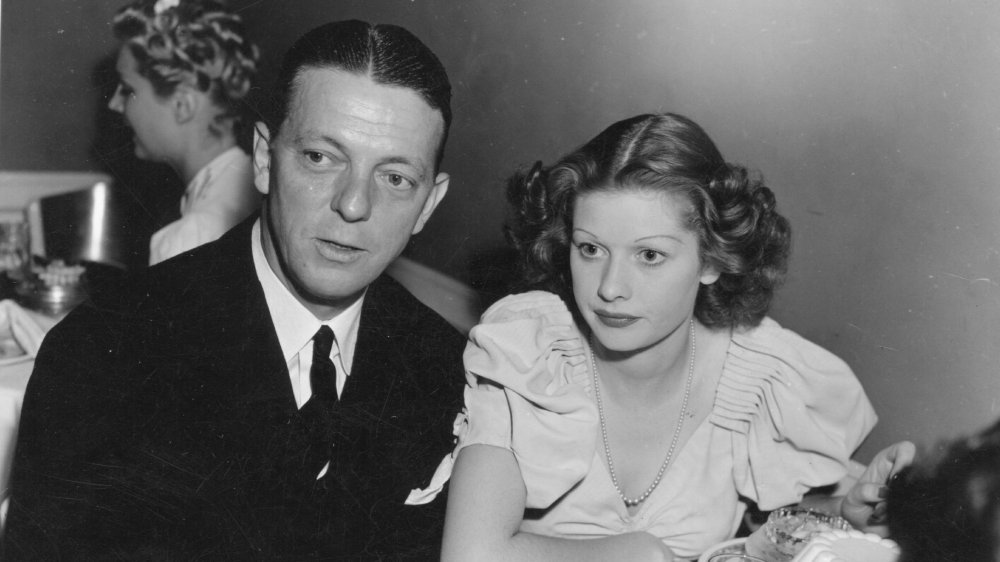 Lucille Ball and Alex Hall at a dinner