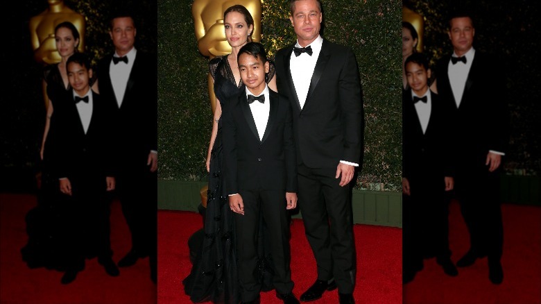 Angelina Jolie, Maddox, Brad Pitt in 2014