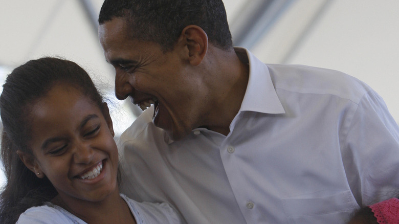 Malia Obama and Barack Obama