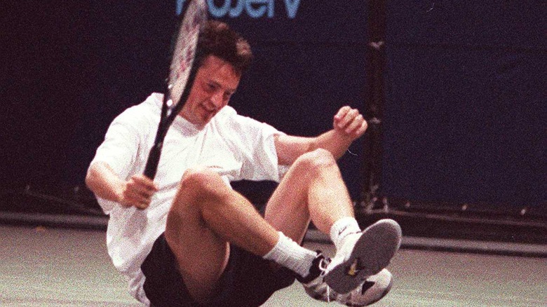 Young Matthew Perry playing tennis