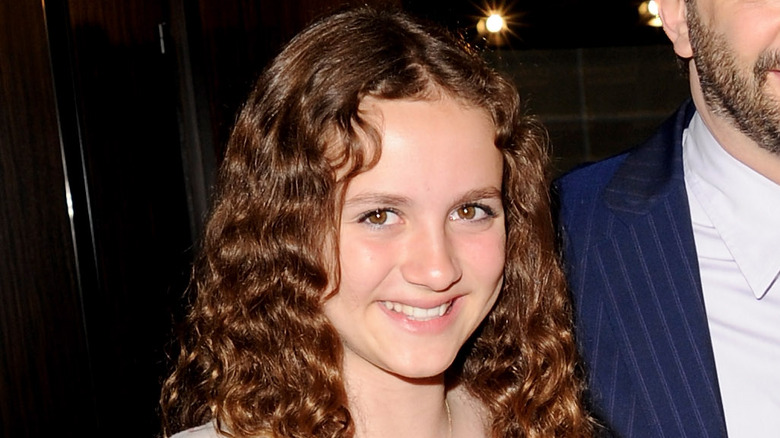 young Maude Apatow smiling