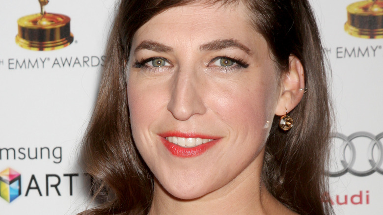 Mayim Bialik smiling at an event