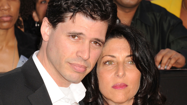 Max Brooks posing with his wife, Michelle