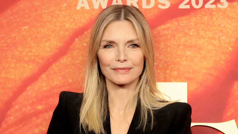 Michelle Pfeiffer posing at awards ceremony