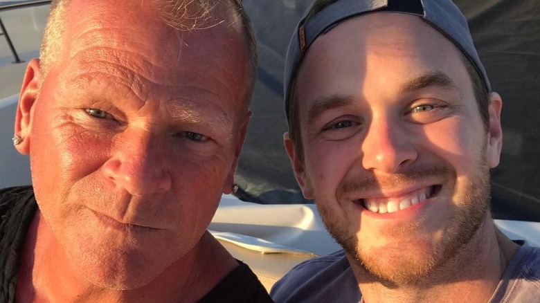 Mike Holmes and son smiling