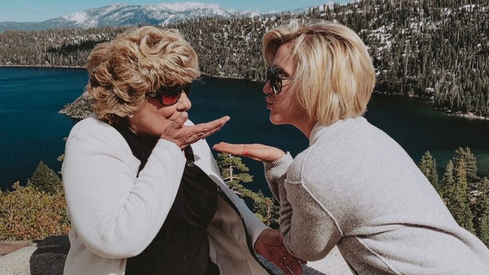 Nanny Faye Chrisley with Savannah Chrisley by a lake