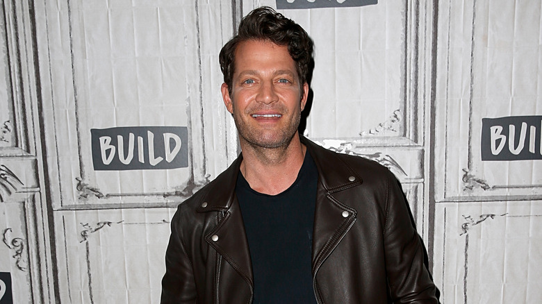 Nate Berkus wearing leather jacket