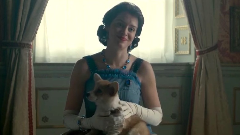 Claire Foy with Corgi in Netflix's The Crown